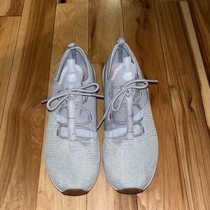 Grey and pink new balance shoes